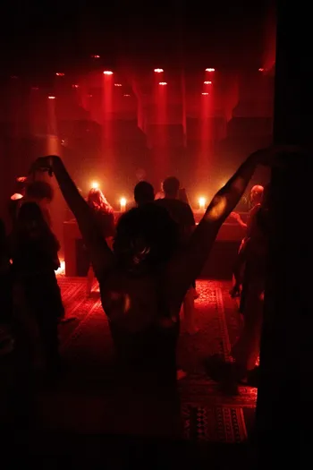 Dancers in red light